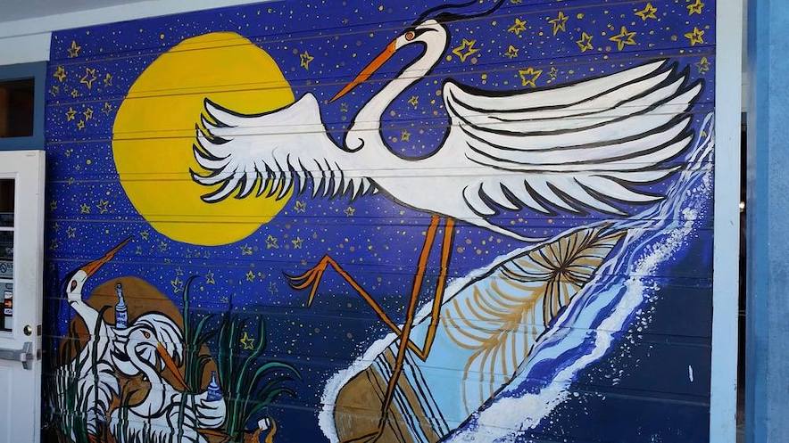 Vibrant heron mural outside the Blue Heron in Duncan's Mills 