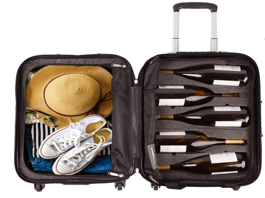 vingarde valise open to show wine bottle stored safely inside 