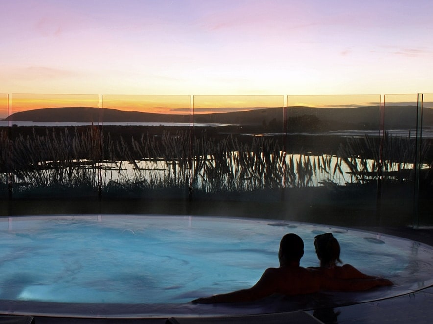 Two guests in hot tub at Bodega Bay lodge in Sonoma County