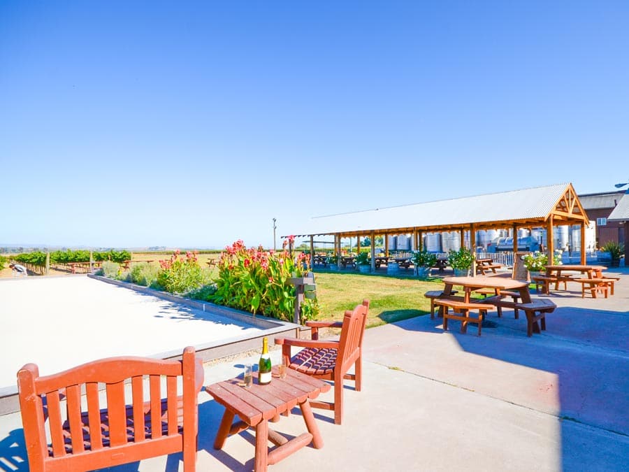 A bocce court and tasting pavilion on a sunny day