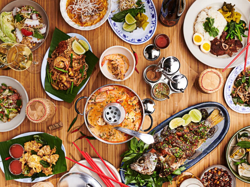 Assorted dishes on a table at Khom Loi