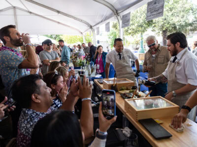 Healdsburg food and wine event group of people watching a chef demo