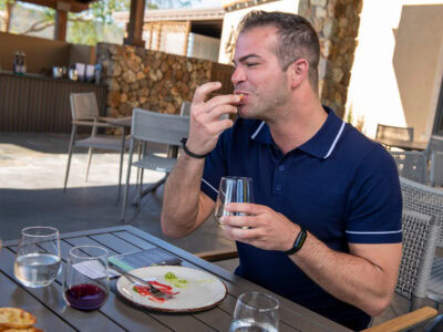 person doing a food and wine experience at st francis