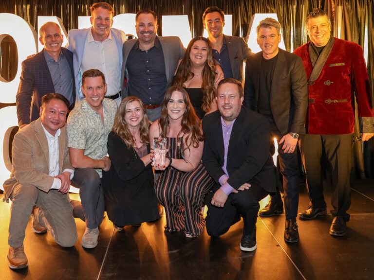 flamingo employees representing the company as they won lodging property of the year