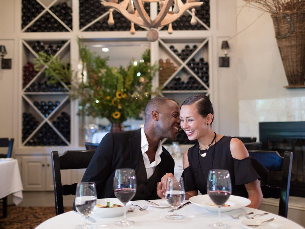 couple having a romantic dinner at the restaurant at farmhouse inn in sonoma county
