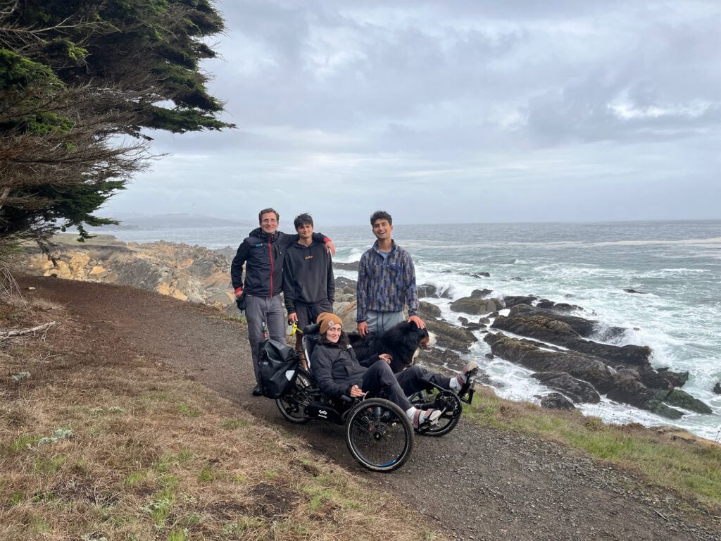 family travel with a visitor in a wheelchair exploring the sea ranch in sonoma county