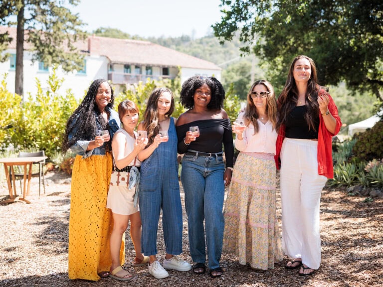 girls having a good time at bartholomew estate winery in sonoma