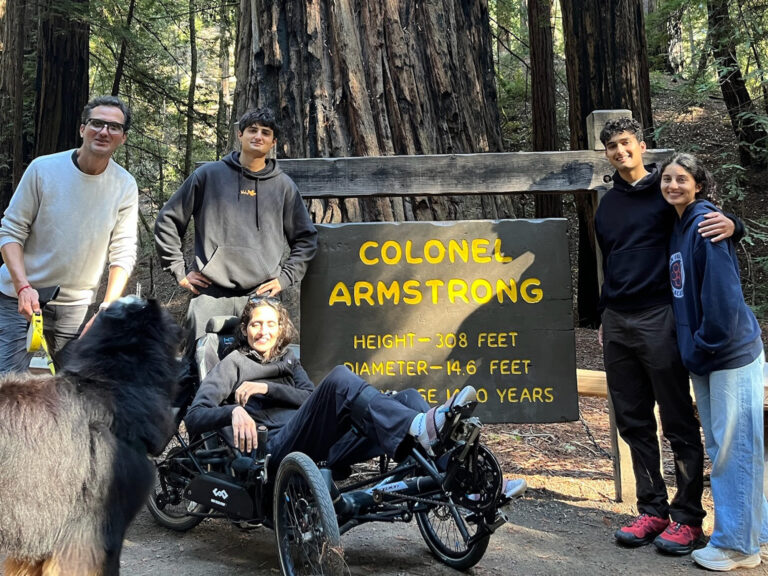 a family visiting armstrong redwoods state park that is wheelchair accessible