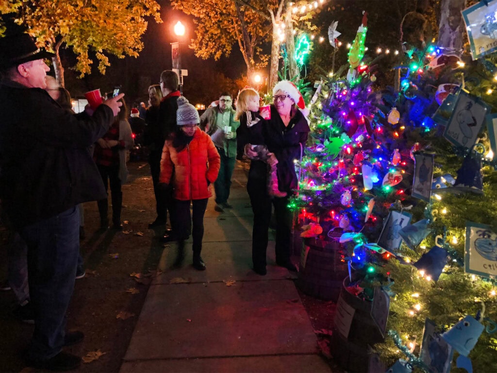 family enjoying the charlie brown christmas tree grove event in windsor sonoma county