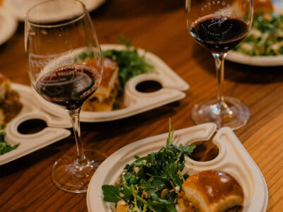 wine and a plate of slider being served at passport wine event in sonoma county