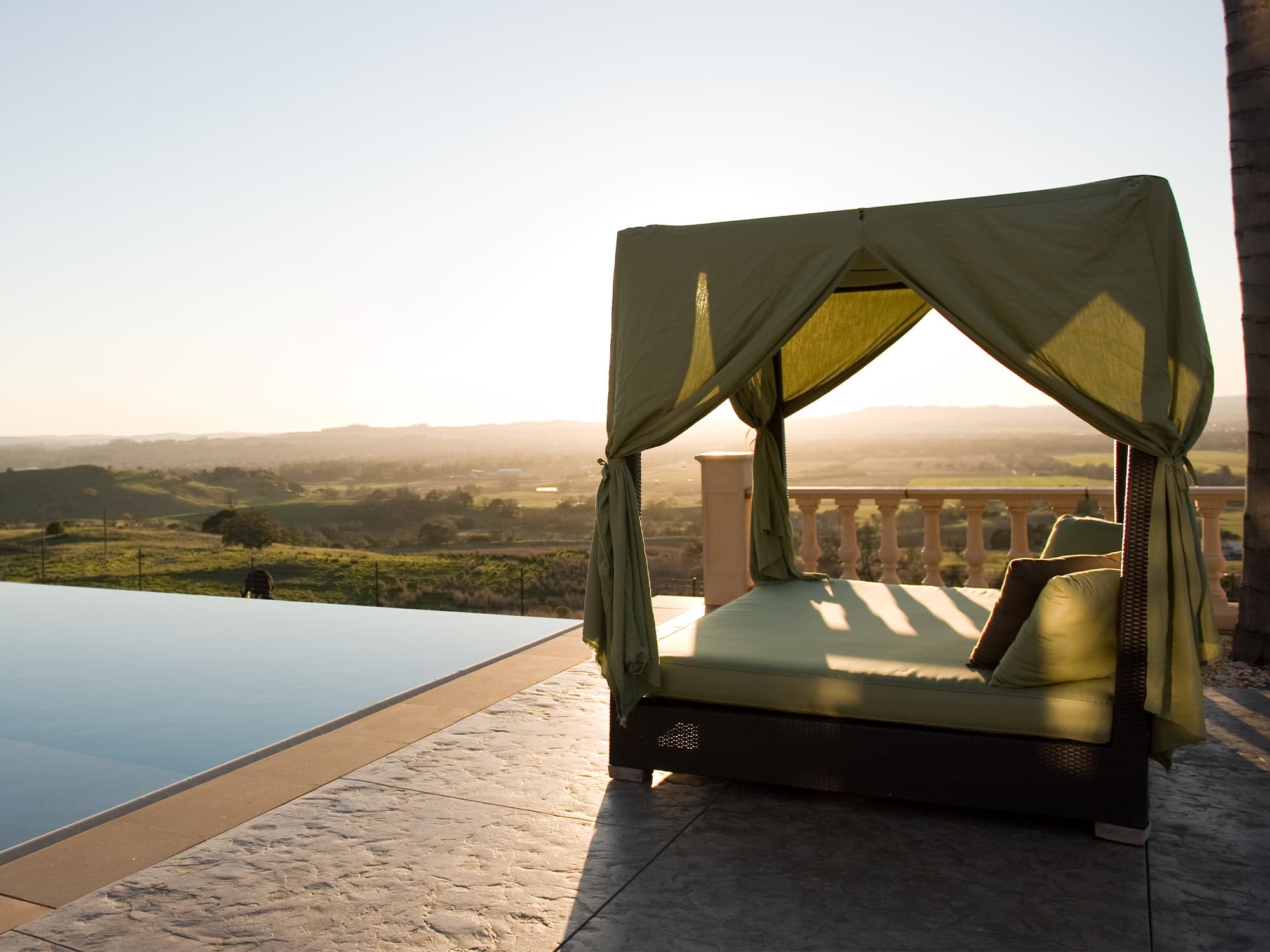 a cabana on the edge of the pool at a vacation rental in sonoma
