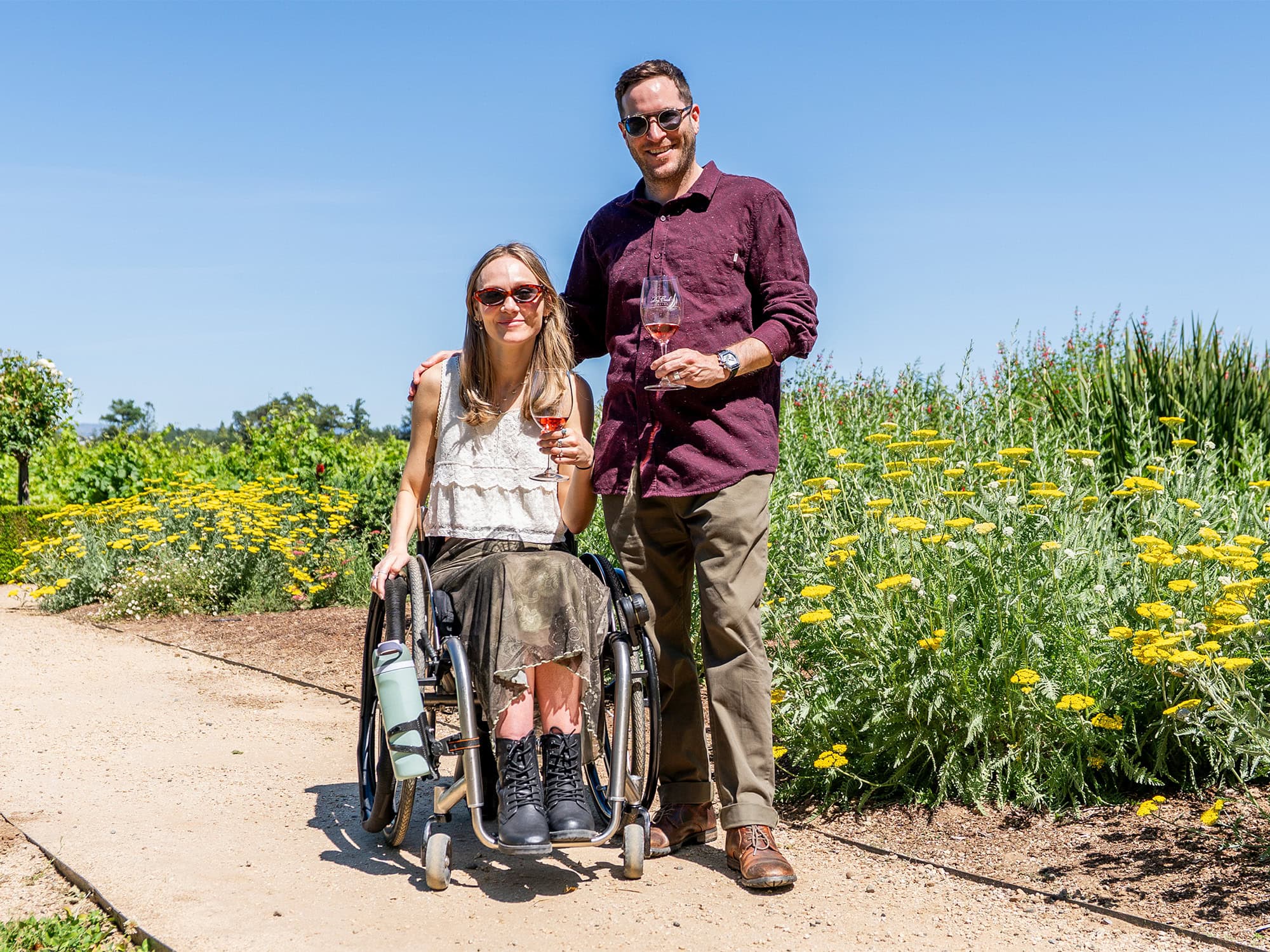 couple enjoying a glass of wine at the accessible winery dry creek vineyards in sonoma county