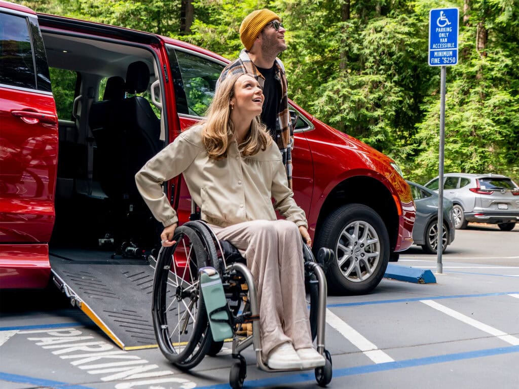 wheelchair user getting out of a accessible van 