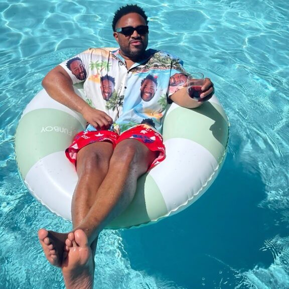 traveler enjoying the pool at dawn ranch