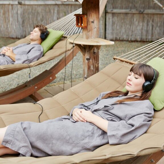 Osmosis_Spa_Freestone Women lounging on hammocks at Osmosis Day Spa Sanctuary in Freestone, California