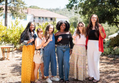 girls having a good time at bartholomew estate winery in sonoma