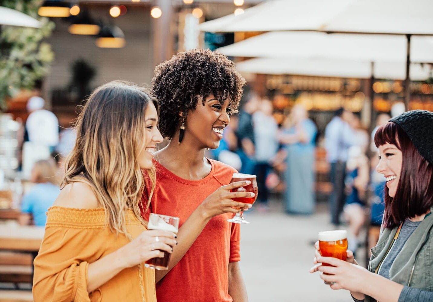 Women gather outside while enjoying a glass of wine in Sonoma County.